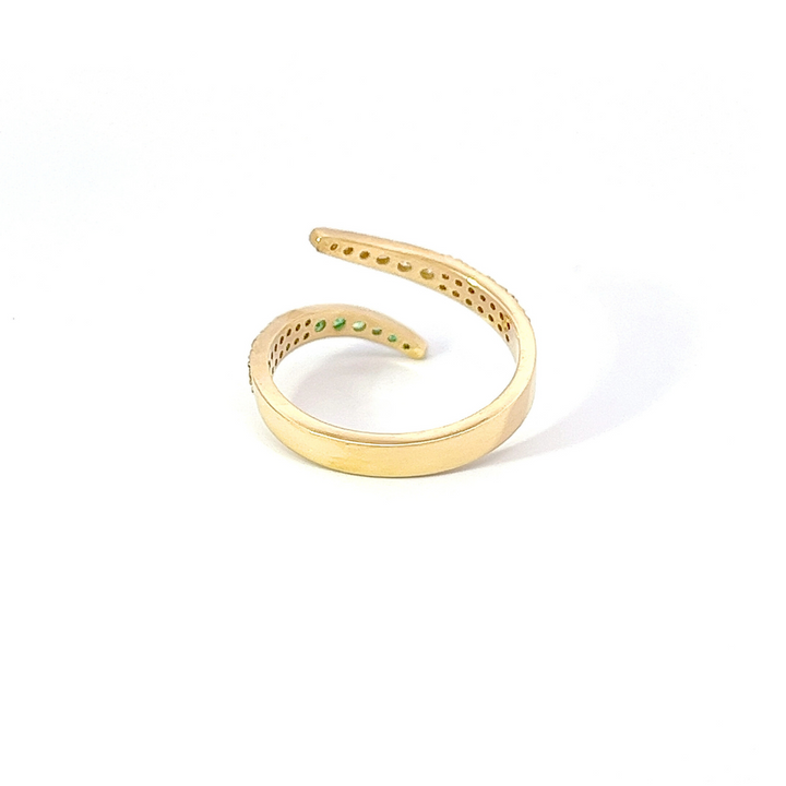 Bague torsadée en diamant et émeraude verte